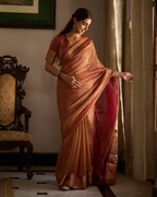 Mṛdula Brick Red Solid Crushed Tissue Saree