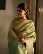 Nazara Green Solid Crushed Tissue Saree