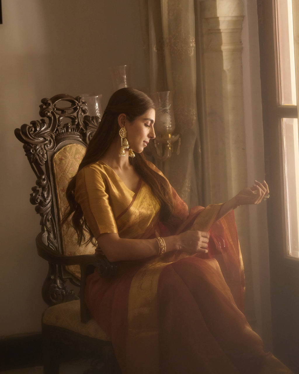 Svara Rust Orange Solid Crushed Tissue Saree