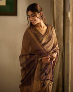 Vrishti Purple Solid Crushed Tissue Saree