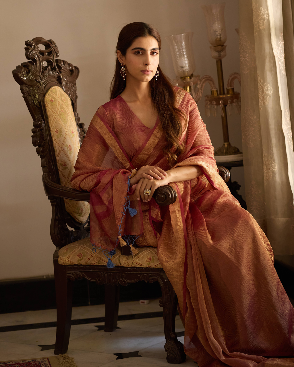 Mṛdula Brick Red Solid Crushed Tissue Saree