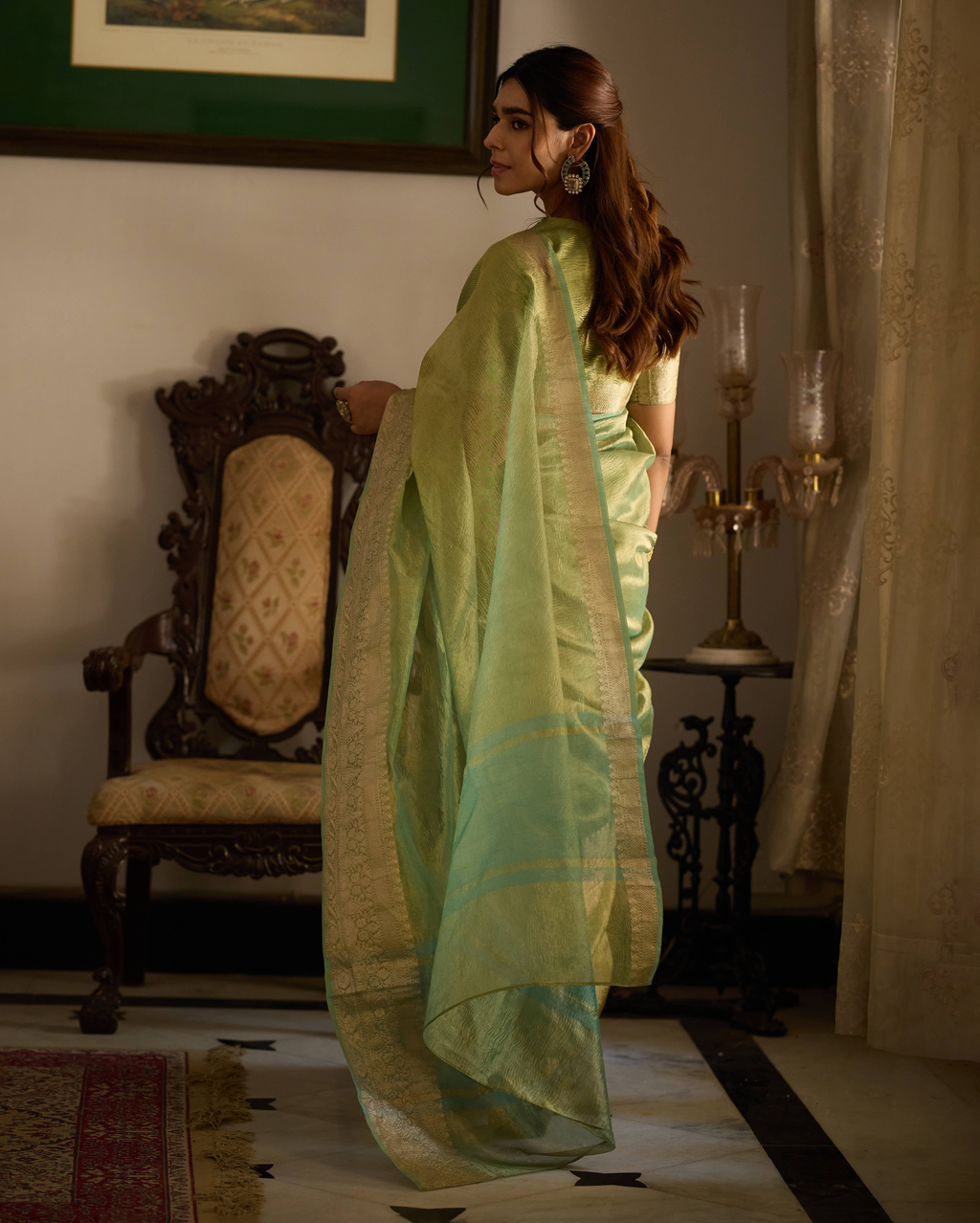 Nazara Green Solid Crushed Tissue Saree
