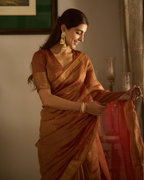 Hima Brown Solid Crushed Tissue Saree