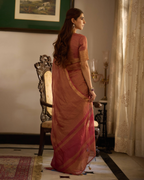 Mṛdula Brick Red Solid Crushed Tissue Saree